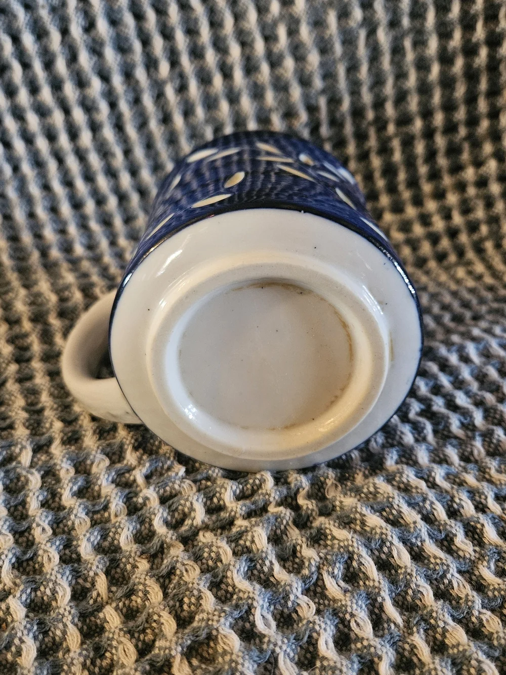 Blue Ceramic Coffee Mug with White Leaf Accent